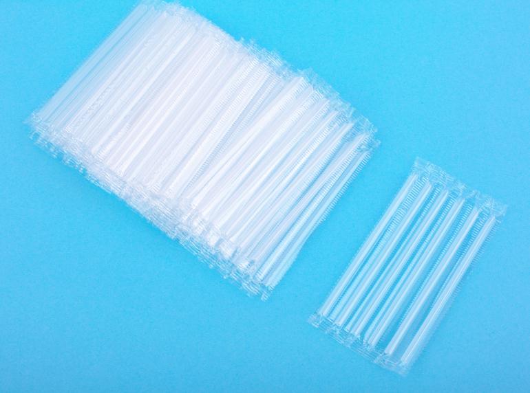 single packed straws in row
